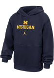 Main image for Youth Michigan Wolverines Navy Blue Nike Logo Wordmark Jordan Long Sleeve Hooded Sweatshirt