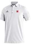 Main image for Mens Nebraska Cornhuskers White Adidas Heat Seal Stadium Coaches Short Sleeve Polo Shirt
