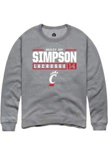 Hailey Joy Simpson  Rally Cincinnati Bearcats Mens Graphite NIL Stacked Box Long Sleeve Crew Sweat..