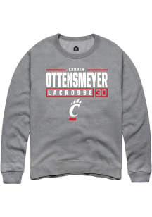 Lauren ottensmeyer  Rally Cincinnati Bearcats Mens Graphite NIL Stacked Box Long Sleeve Crew Sweat..